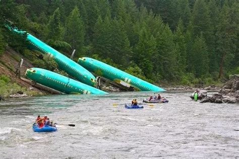 Train derailment causes three Boeing 737 fuselages to fall down the ...