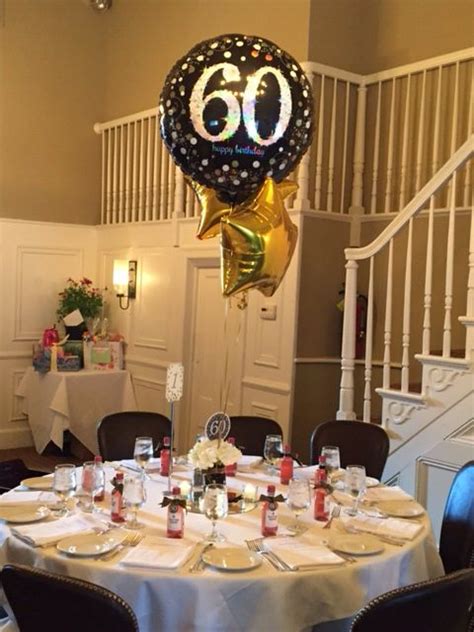 60th birthday party centerpiece in black and gold. … | 60th birthday party decorations, 60th ...