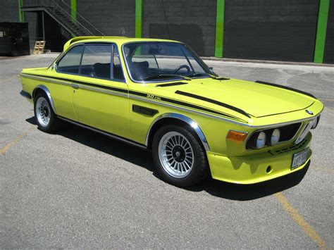 A Classic 1972 BMW 3.0CSL dressed in a lime yellow color