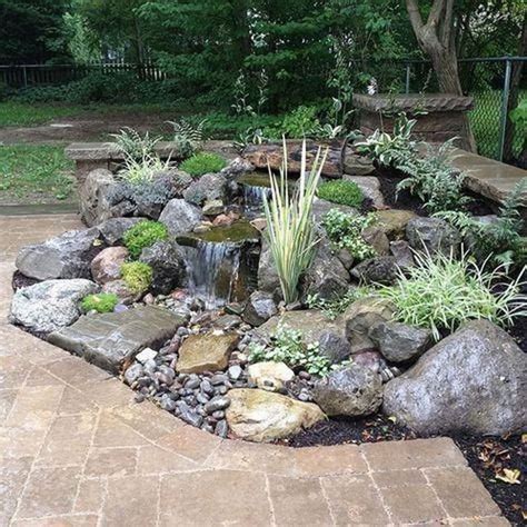 Pondless waterfall | Backyard water feature, Water features in the garden, Waterfalls backyard