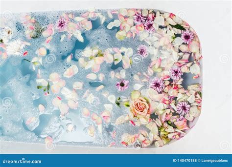 Top View of Bath Filled with Blue Bubble Water, Flowers and Petals Stock Photo - Image of filled ...