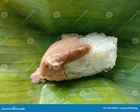 Sticky Rice Wrapped in Banana Leaves is a Dessert Made with Sticky Rice ...