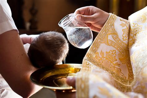 Infant,Baptism.,Water,Is,Poured,On,The,Head,Of,An - Catholic Digest