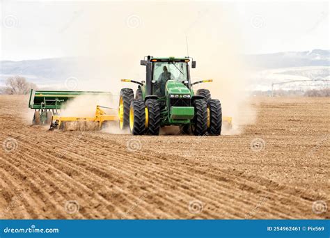 A Farmer Uses a Tractor To Plant Wheat Editorial Photo - Image of grain ...