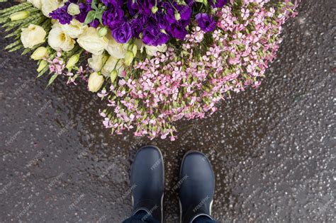 Premium Photo | Man's legs in blue rubber boot standing close to a ...