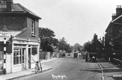 an old black and white photo of a town street