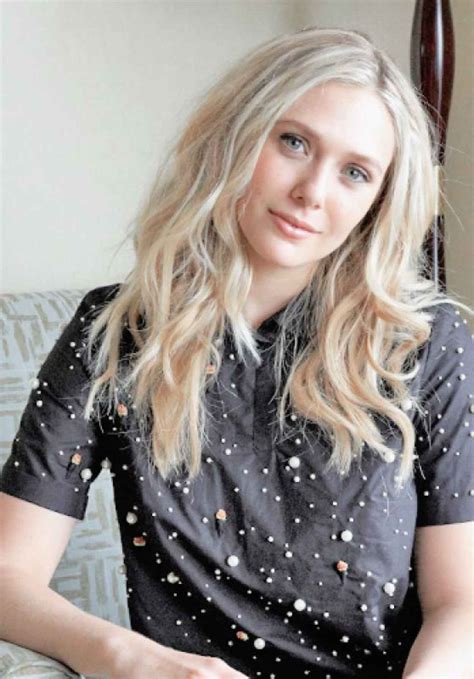 Elizabeth Olsen Photoshoot – June 2015 – celebsla.com