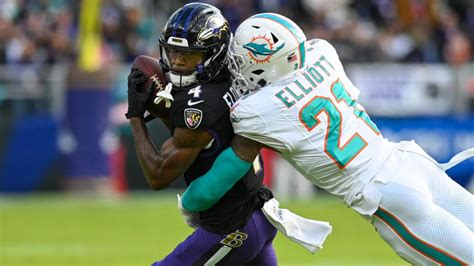 Ravens vs. Dolphins score, takeaways: Baltimore clinches AFC's top seed as Lamar Jackson makes ...