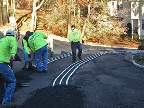 Tire track radiant custom heated driveway installation. Take a look at what your tire tracks ...