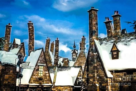 Snowy Hogsmeade Village Rooftops Photograph by Gary Keesler - Pixels