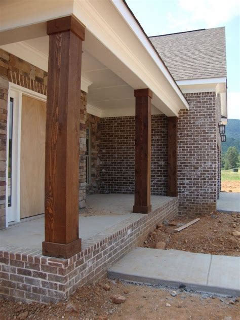 Excellent Natural Veranda With Wooden Porch Columns Also Brick Wall Exposed Views | Square Porch ...