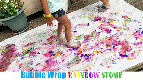 Bubble Wrap Rainbow Stomp Painting - Happy Toddler Playtime