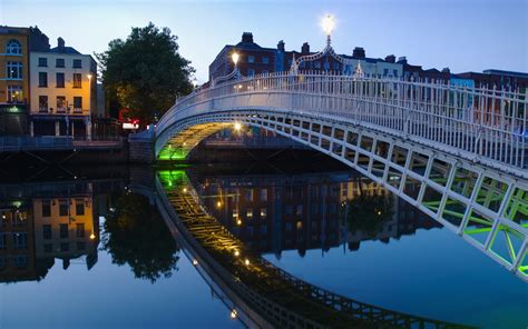 The Ha'penny Bridge over the Liiffy River, Dublin, Ireland - The Irish Rose