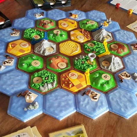 Catan board game pieces - spacesmain