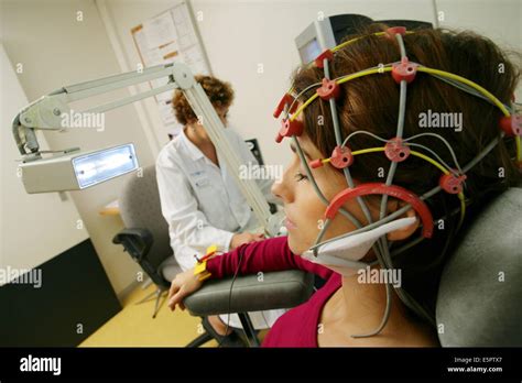 Patient undergoing an electroencephalogram (EEG Stock Photo: 72417247 ...