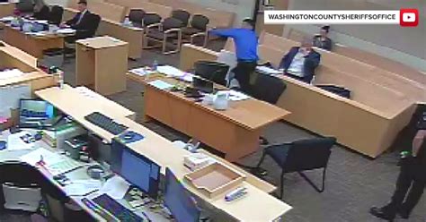 Surveillance video shows murder suspect flee courthouse