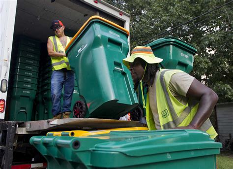 Waste Management delivers new trash cans, service in Conroe