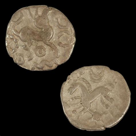 ANCIENT ART — An Iron Age coin representing a silver half unit ...