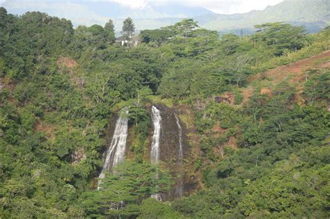 Opaekaa Falls - Distant Waterfalls seen from a Roadside View