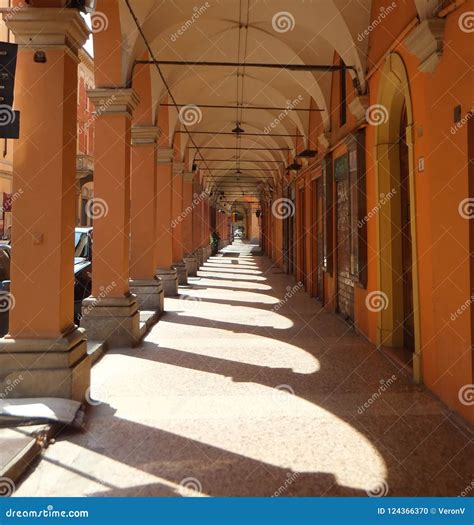 A Portico in Bologna, Italy. Columns Creating Sharply Defined Shadows on the Stone Pavement ...