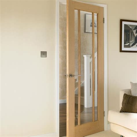 Howdens Worcester Oak 3 Panel Clear Glazed Door | Howdens