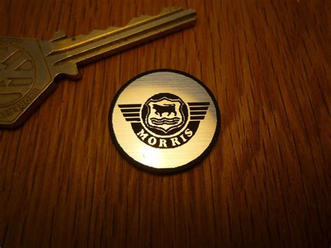 Morris Logo Circular Laser Cut Self Adhesive Car Badge. 25mm.