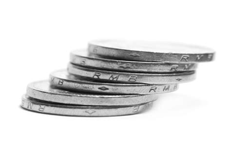 Premium Photo | Silver coins stacked