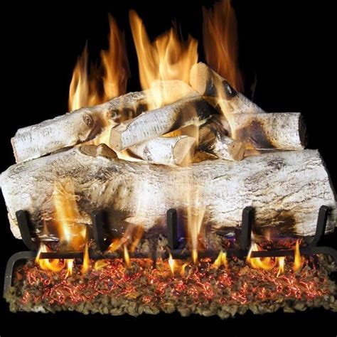 an outdoor fireplace with logs and flames