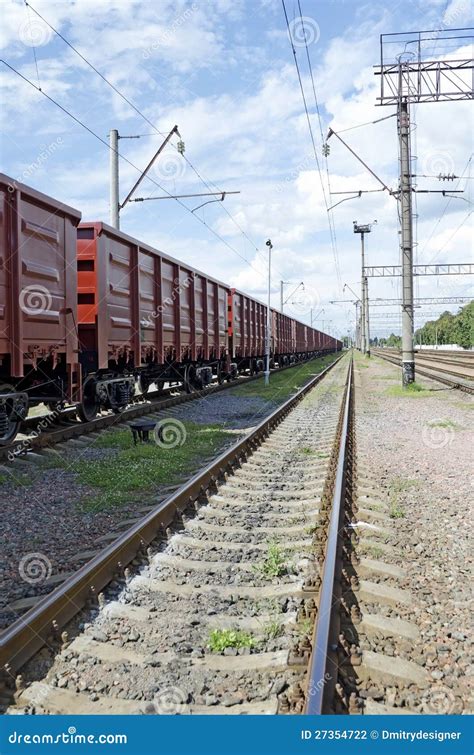 Cargo train at the station stock photo. Image of sleepers - 27354722