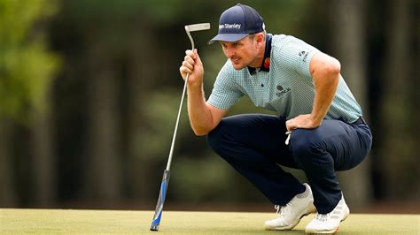 Justin Rose of England eyes his putt on No. 18 during Round 2 of the ...