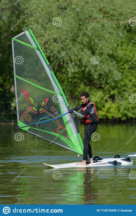 Novice Male Windsurfer Doing Routine Stock Image - Image of windsurfer ...