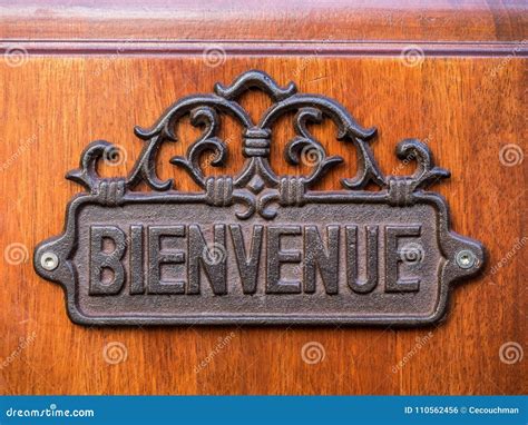 Metal Bienvenue Welcome Sign Stock Photo - Image of restaurant, metal: 110562456