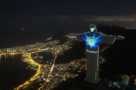Christ the Redeemer statue wearing a protective mask in Brazil
