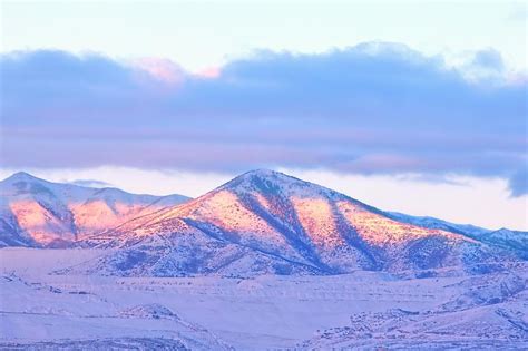 Sunrise On Snow Capped Mountains Photograph by Tracie Kaska - Fine Art America