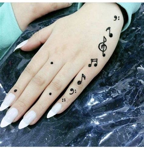 Share more than 72 mehndi design with tattoo best - vova.edu.vn