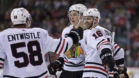 Blackhawks rookie Connor Bedard departs after big hit by Devils ...