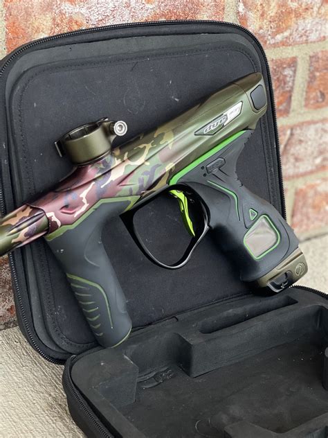 Used Dye M3+ Paintball Gun - PGA Woodland w/Lime Scythe Trigger