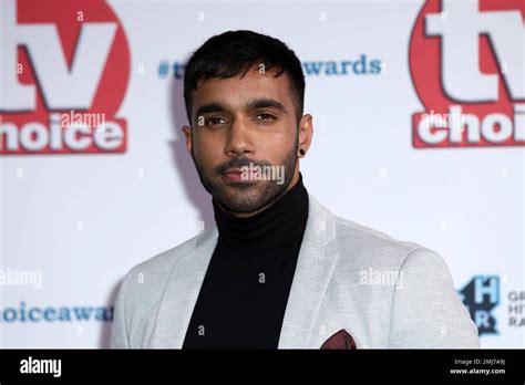 Actor Rishi Nair poses for photographers on arrival at the TV Choice ...