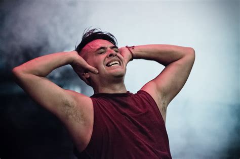 Man in Maroon Tank Top · Free Stock Photo