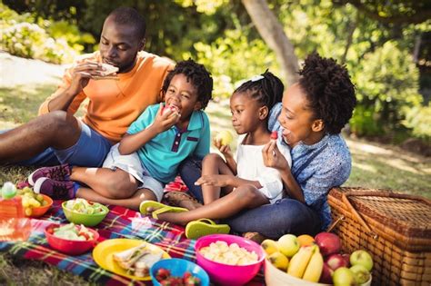 Premium Photo | Happy family eating together