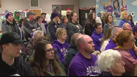 Bishop Guilfoyle Football team gets warm reception after State Championship loss - YouTube