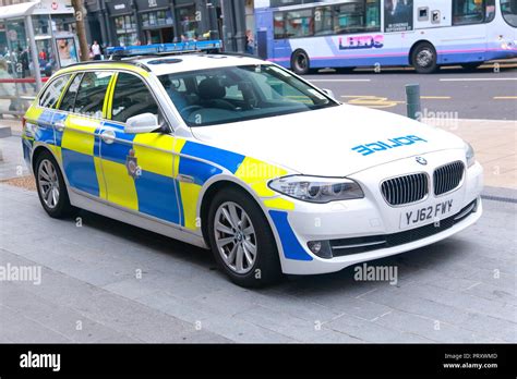 A bmw police car parked outside Trinity Shopping Centre in Leeds City Centre,West Yorkshire ...