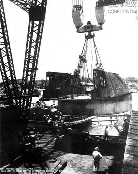 USS Arizona (BB-39) having a turret removed for a dramatically ...