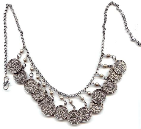 Egyptian silver w/ Arabic design | Arabic jewelry, Silver coin necklace, Traditional jewelry