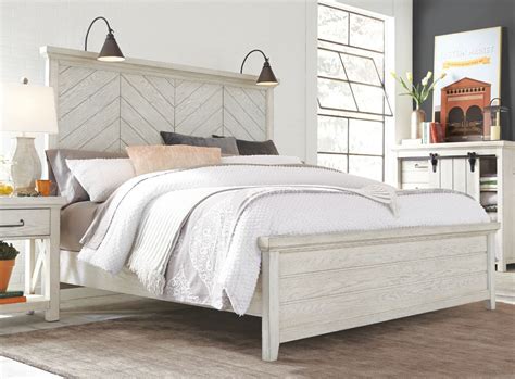 Bring Farmhouse style to your bedroom decor with this White Queen Bed. The whitewashed panel ...