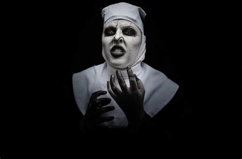 Premium Photo | Halloween the nun, makeup based on the movie the nun made by a brazilian for ...