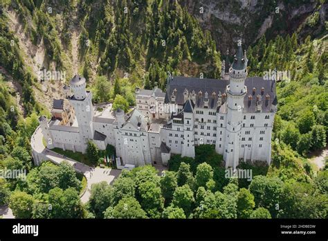 Aerial view of Neuschwanstein Castle. Paragliding above Schloss Neuschwanstein in Bavaria ...