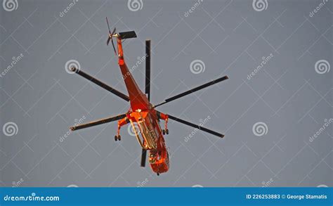 A Firefighting Erickson S-64 Aircrane Helicopter Operates In Hymettus ...