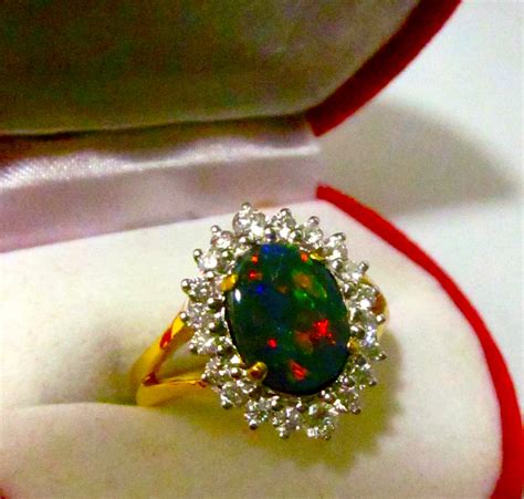 Opal Australian rings handcrafted Australian opal jewellery with natural opals at Wholesale prices.