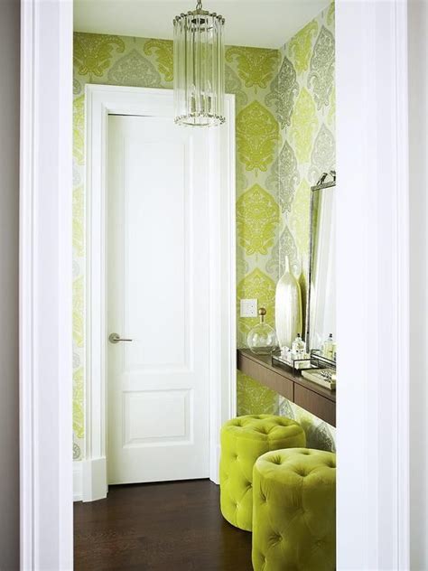 Chartreuse green foyer features walls clad in green and gray flocked ...